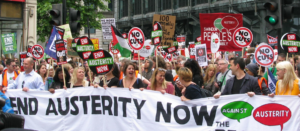 Demonstrators and People's assembly banner at an Anti-austerity protest