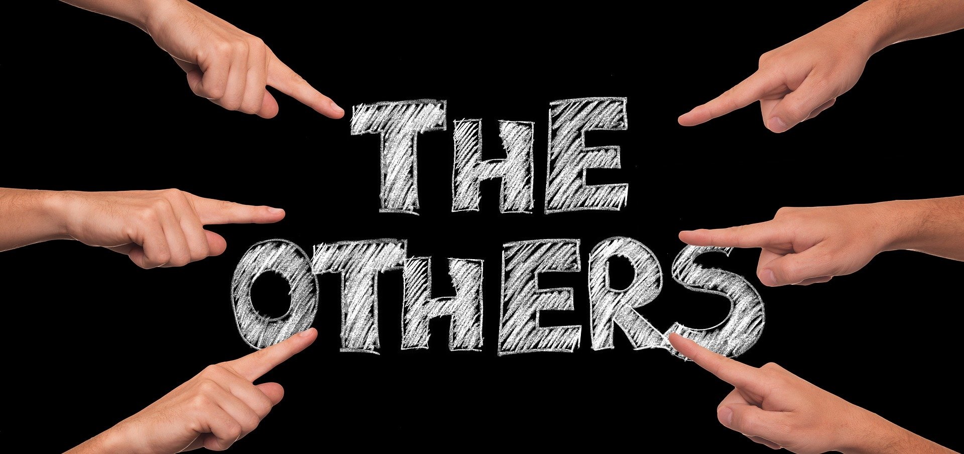 Fingers pointing at the words "The others"