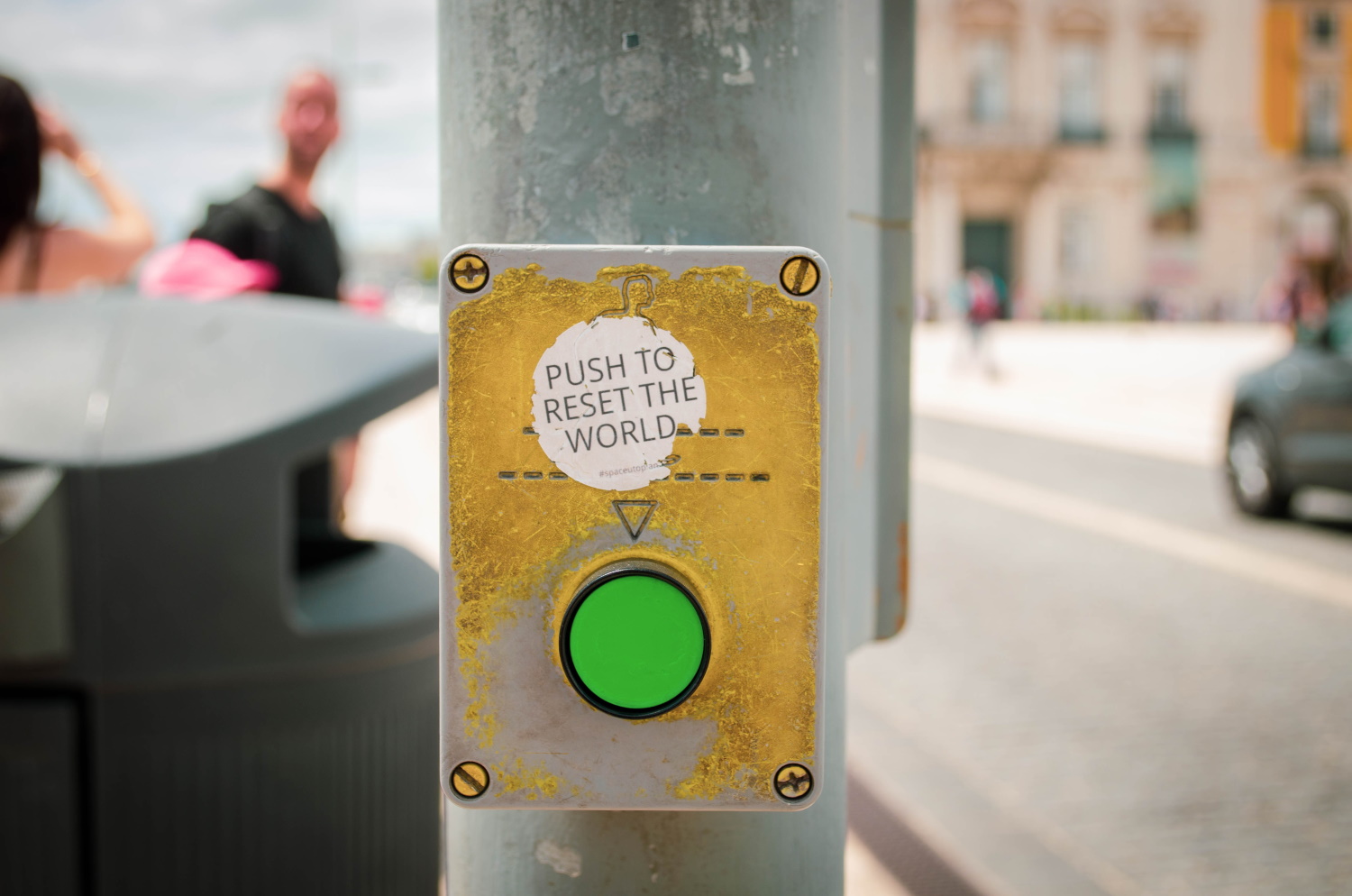 Button with label "Push to reset the world"